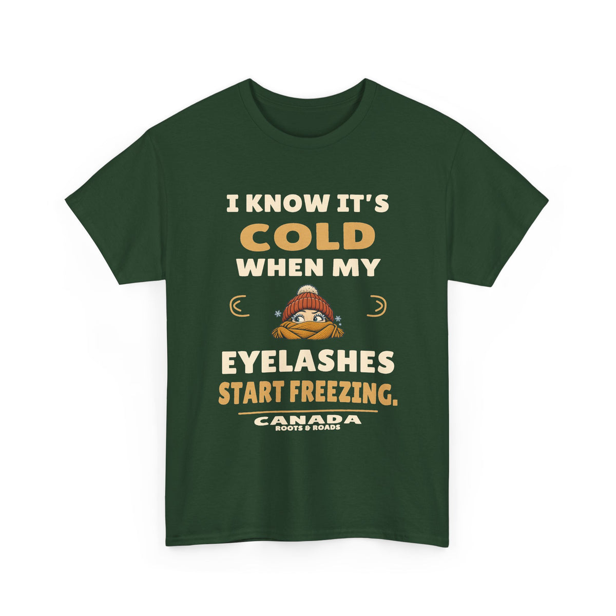 Canada Freezing Eyelashes T-Shirt in Forest Green, front winter hat and scarf illustration with the quote “I know it’s cold when my eyelashes start freezing.”