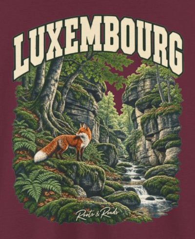 Print detail on the Maroon Luxembourg supplier T-shirt mockup: country lettering, a red fox, mossy rocks, woodland roots, ferns and a flowing stream, and Roots & Roads script.