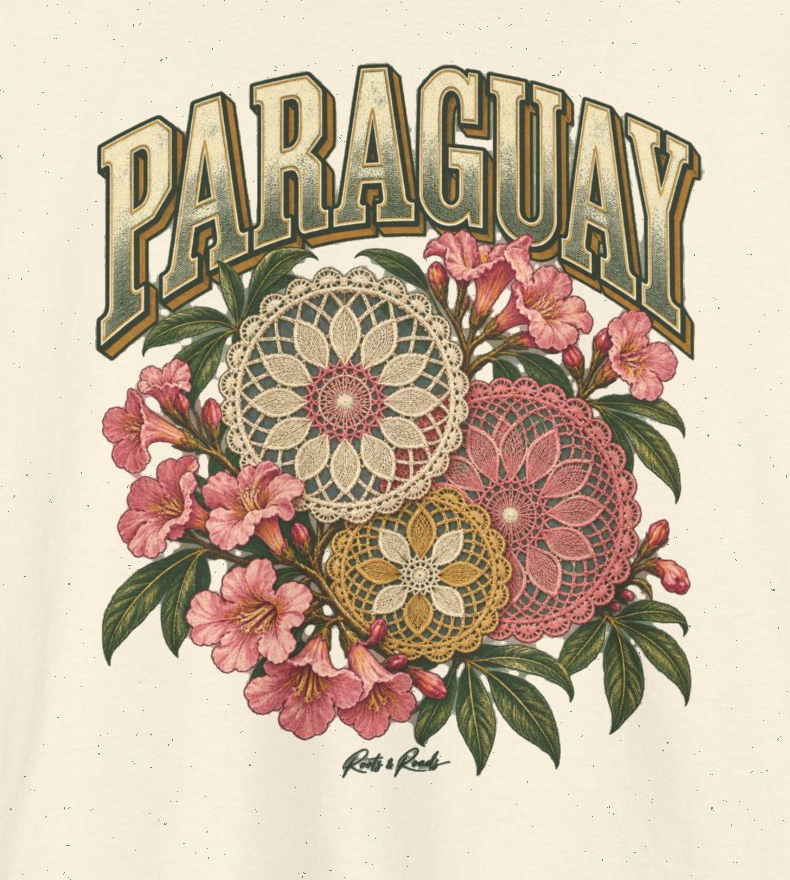 Print detail of PARAGUAY lettering, cream pink and ochre lace rosettes, pink flowers, green leaves and the original Roots & Roads script on Natural cotton.