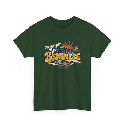 Alternate front view of the Forest Green Beninese Thing T-shirt with “You wouldn’t get it. It’s a Beninese thing.” gold bubble lettering with cream outlines, an integrated stilt village, canoe and sunset.