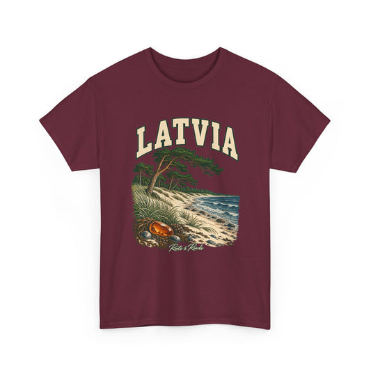Front view of a Maroon Gildan 5000 T-shirt with cream LATVIA lettering, a coastal pine, dune grass, waves, pebbles and an amber-coloured stone, and Roots & Roads script.