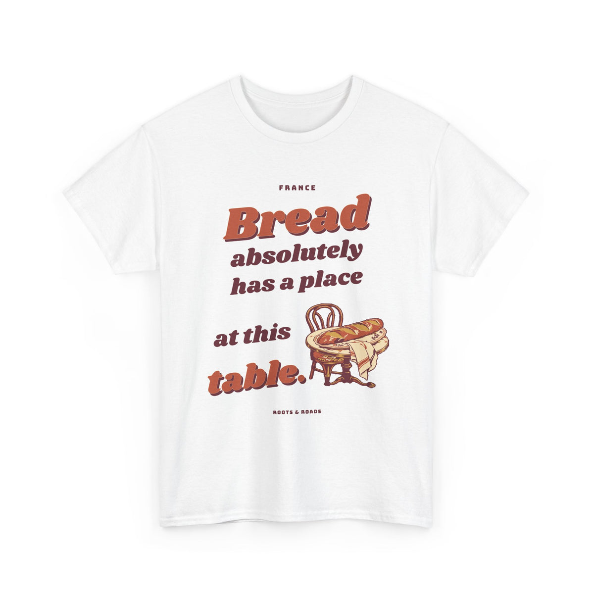 France Bread at the Table T-Shirt in White — front retro bakery lettering with a golden baguette at a bistro table.