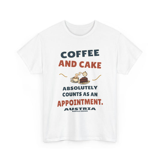 Austria Coffee and Cake Appointment T-Shirt in White, with the full quote “Coffee and cake absolutely counts as an appointment.”, Austria label, and Roots & Roads signature on the front.