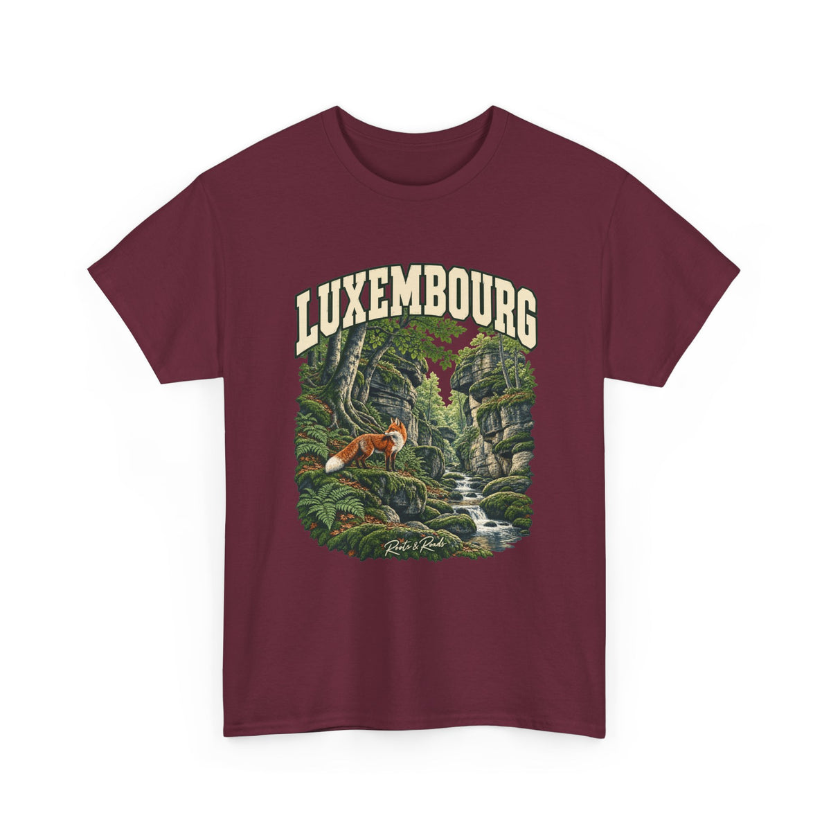 Front view of a Maroon Gildan 5000 T-shirt with cream LUXEMBOURG lettering, a red fox, mossy rocks, woodland roots, ferns and a flowing stream, and Roots & Roads script.