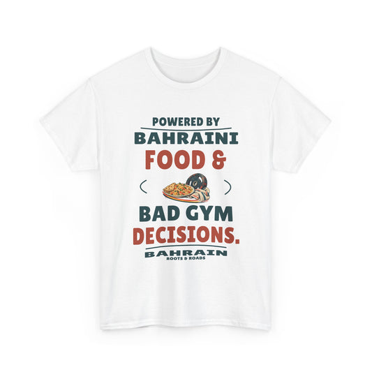 White Bahrain Bad Gym Decisions T-Shirt, front view with rounded retro lettering reading “Powered by Bahraini food & bad gym decisions.”, a plate of food, weight plate and gym towel, Bahrain label and Roots & Roads signature.