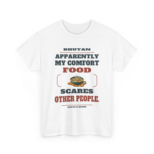White Bhutan Comfort Food T-Shirt front, reading “Apparently my comfort food scares other people.” with Bhutan and Roots & Roads signature
