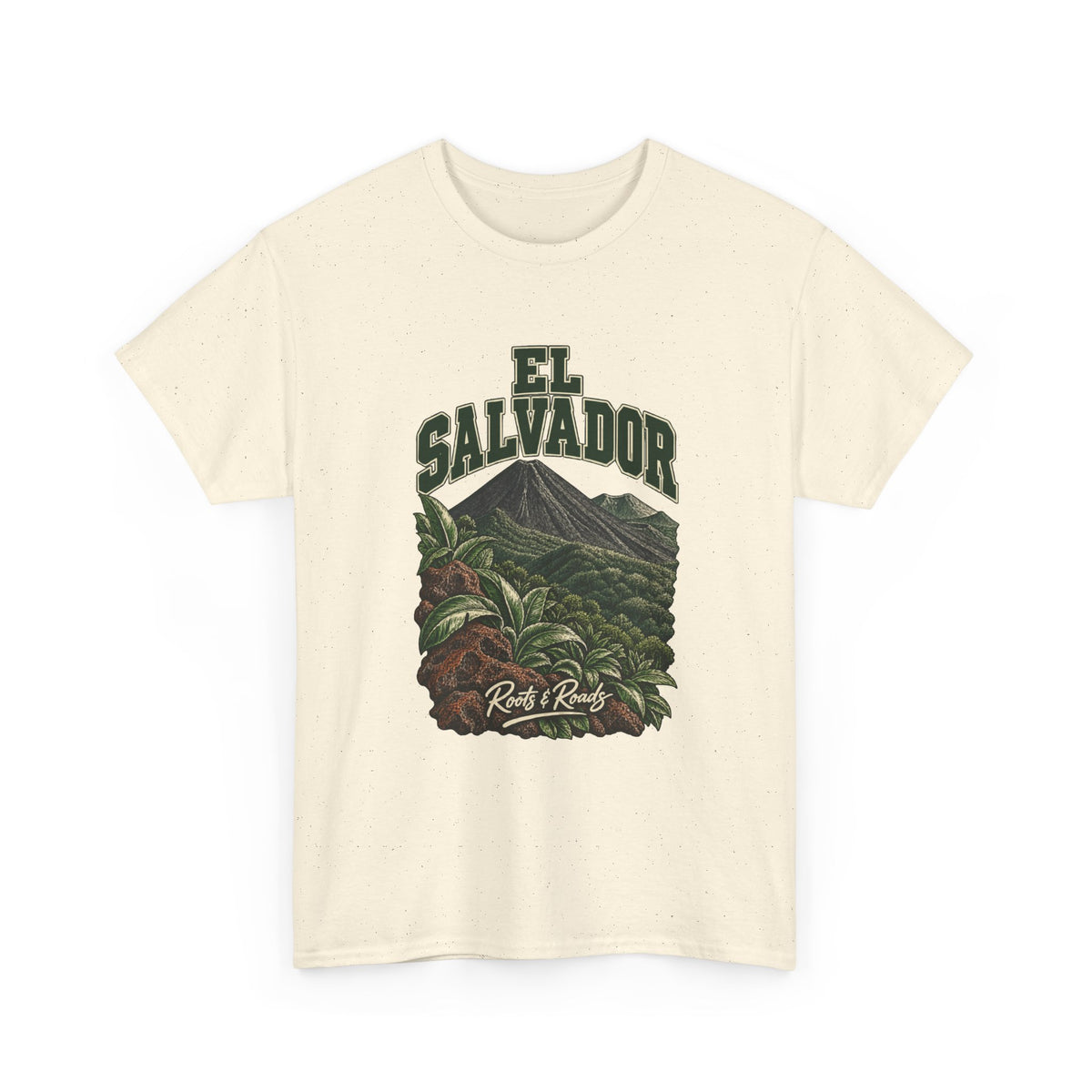 Front view of a Natural Gildan 5000 T-shirt with green two-line EL SALVADOR lettering above a forested volcanic cone, broad leaves and warm lava rocks, finished with Roots & Roads script.