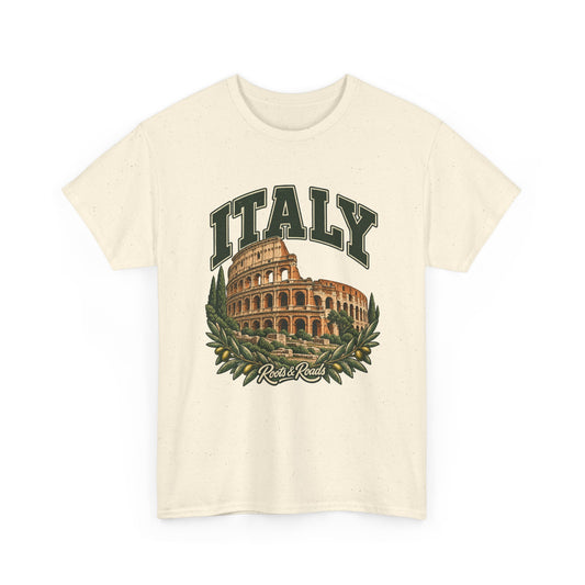 Front view of a Natural Gildan 5000 T-shirt with dark-green ITALY lettering, the Colosseum, stone ruins, cypresses and olive branches, and Roots & Roads script.