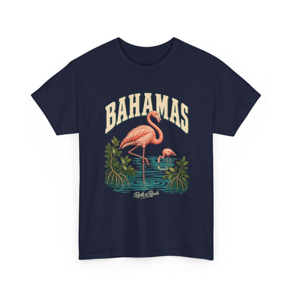 Front view of a Navy Gildan 5000 T-shirt with cream BAHAMAS lettering, coral-pink flamingos, turquoise lagoon ripples, mangrove leaves and Roots & Roads script.