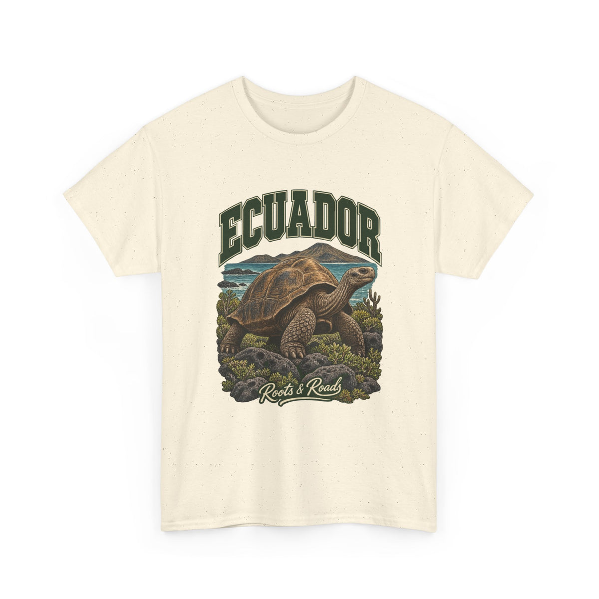 Front view of a Natural Gildan 5000 T-shirt with green ECUADOR lettering above a giant tortoise, volcanic rocks, low plants and coastal water, finished with Roots & Roads script.