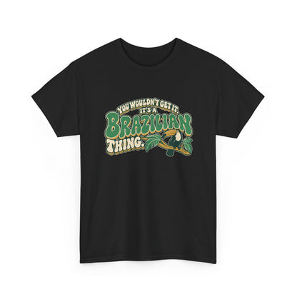Alternate front view of the Black Brazilian Thing T-shirt with “You wouldn’t get it. It’s a Brazilian thing.” green bubble lettering with ivory outlines, ochre shadows and an integrated toucan on a leafy branch.