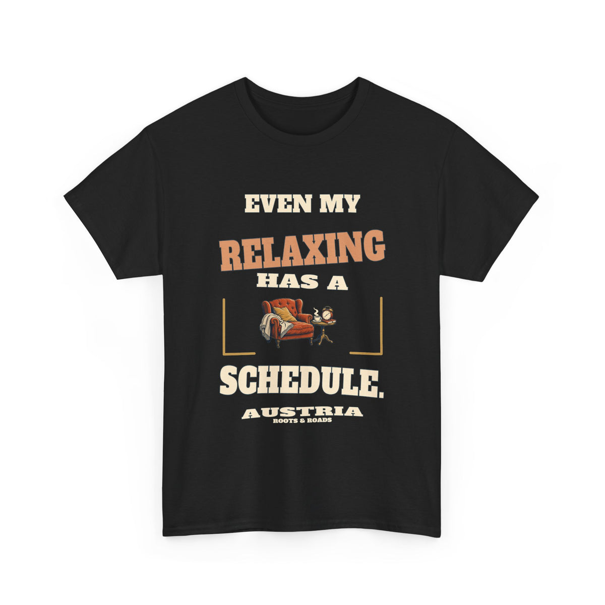 Austria Scheduled Relaxing T-Shirt in Black, with the full quote “Even my relaxing has a schedule.”, Austria label, and Roots & Roads signature on the front.