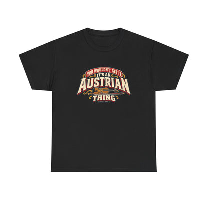 Front view of the Black Austrian Thing T-shirt with “You wouldn’t get it. It’s an Austrian thing” cream athletic lettering with red offset shadows, gold scrolls and a violin with its bow.