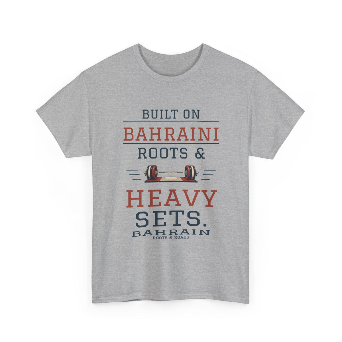 Sport Grey Bahrain Heavy Sets Gym T-Shirt, front view with vintage athletic lettering reading “Built on Bahraini roots & heavy sets.”, a barbell illustration, Bahrain label and Roots & Roads signature.