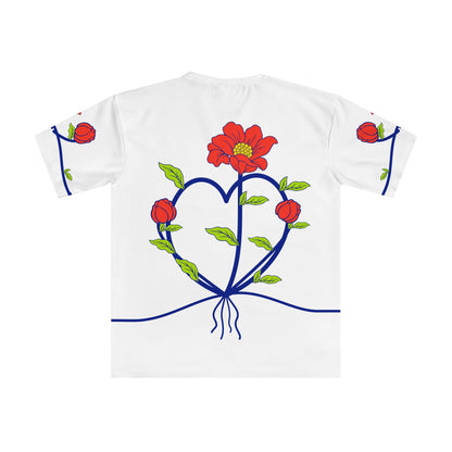 Back of the Roots & Roads “Love speaks every language” T-shirt with heart-shaped cobalt stems, a coral bloom, two buds, lime leaves and roots.