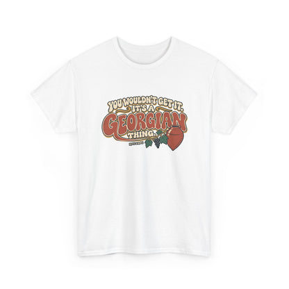 White Georgia Georgian Thing T-shirt, draped front view, with oversized retro lettering, a qvevri vessel and grapevine.