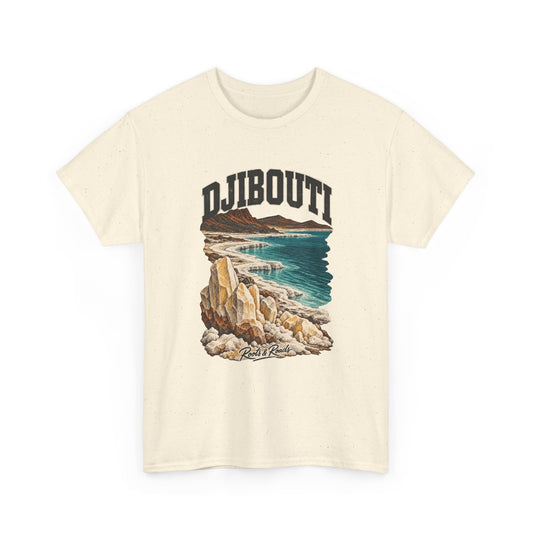 Front view of a Natural Gildan 5000 T-shirt with dark DJIBOUTI lettering, pale salt formations, teal lake water, volcanic ridges and Roots & Roads script.