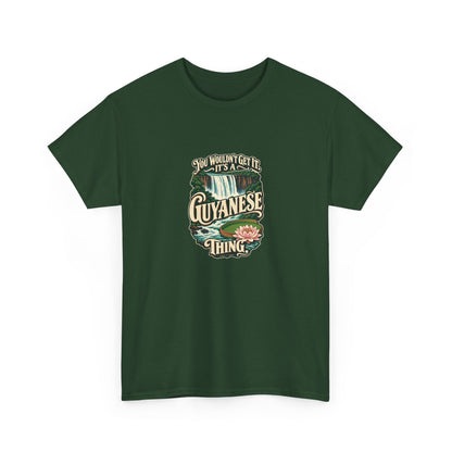Guyana Guyanese Thing T-shirt in Forest Green, shaped front view; cream vintage sign-painted lettering with a waterfall and tropical water lily and the quote “You wouldn’t get it. It’s a Guyanese thing.”