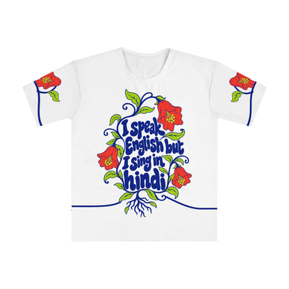 Front of the Roots & Roads “I speak English but I sing in hindi” T-shirt with cobalt bubble lettering, coral flowers and lime leaves on white.