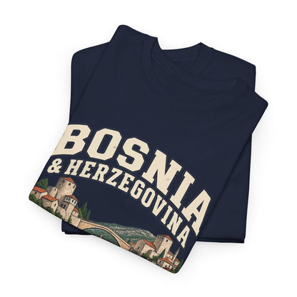 Folded Navy Bosnia & Herzegovina Fresh Prints T-shirt showing two-line cream country lettering above stone buildings and a curved bridge.