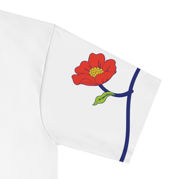 Close-up of the botanical artwork on the I bloom in foreign soil T-shirt