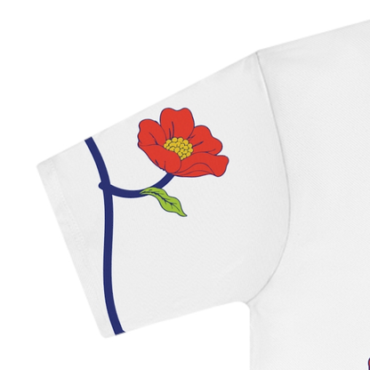 Close-up of the botanical artwork on the I bloom in foreign soil T-shirt