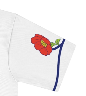 Actual supplier mockup detail of the Roots & Roads “I speak English but my heart is French” T-shirt’s botanical artwork.