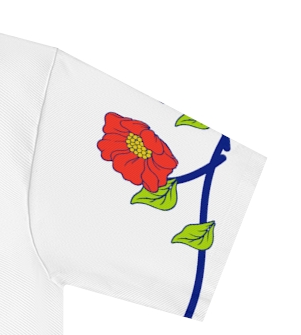 Actual supplier mockup detail of the Roots & Roads “Belonging in two places at once·” T-shirt’s botanical artwork.
