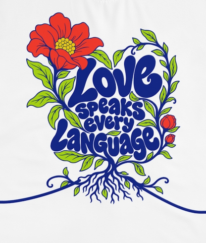 Actual supplier mockup detail of the Roots & Roads “Love speaks every language” T-shirt’s botanical artwork.