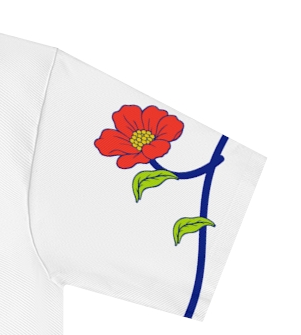 Actual supplier mockup detail of the Roots & Roads “I left home, but home never left me” T-shirt’s botanical artwork.
