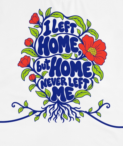 Actual supplier mockup detail of the Roots & Roads “I left home, but home never left me” T-shirt’s botanical artwork.
