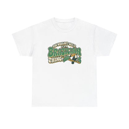 Front view of the White Brazilian Thing T-shirt with “You wouldn’t get it. It’s a Brazilian thing.” green bubble lettering with ivory outlines, ochre shadows and an integrated toucan on a leafy branch.