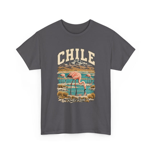 Front view of a Charcoal Gildan 5000 T-shirt with cream CHILE lettering above pink flamingos in a blue salt lagoon beneath mountain ridges, finished with Roots & Roads script.