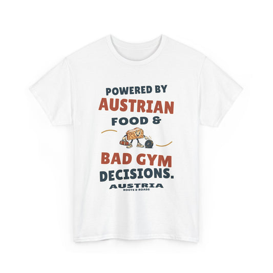Austria Bad Gym Decisions T-Shirt in White, with the full quote “Powered by Austrian food & bad gym decisions.”, Austria label, and Roots & Roads signature on the front.