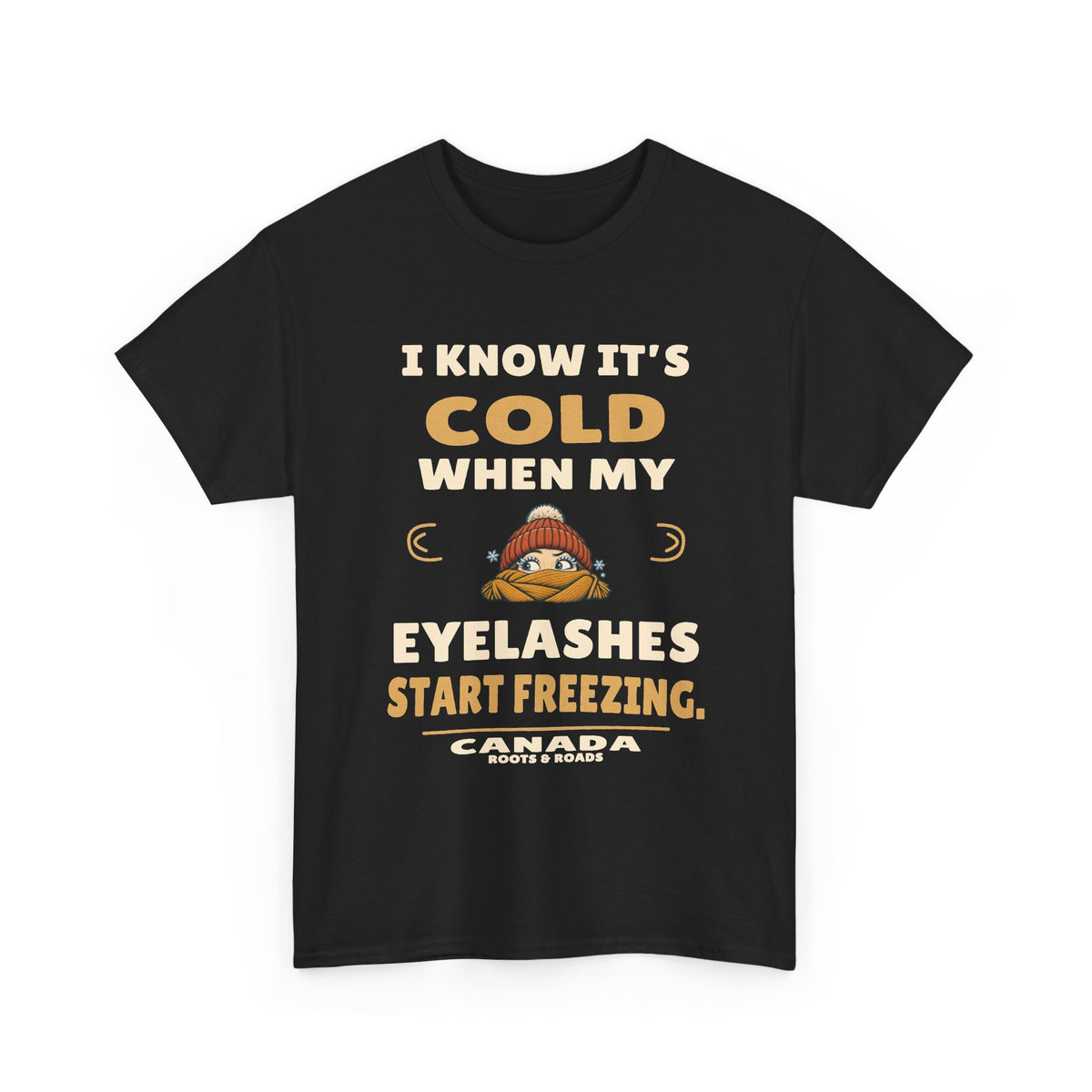 Canada Freezing Eyelashes T-Shirt in Black, front winter hat and scarf illustration with the quote “I know it’s cold when my eyelashes start freezing.”