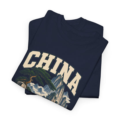 Folded Navy China Fresh Prints T-shirt showing cream CHINA lettering above a pine and cloud-wrapped granite peaks.