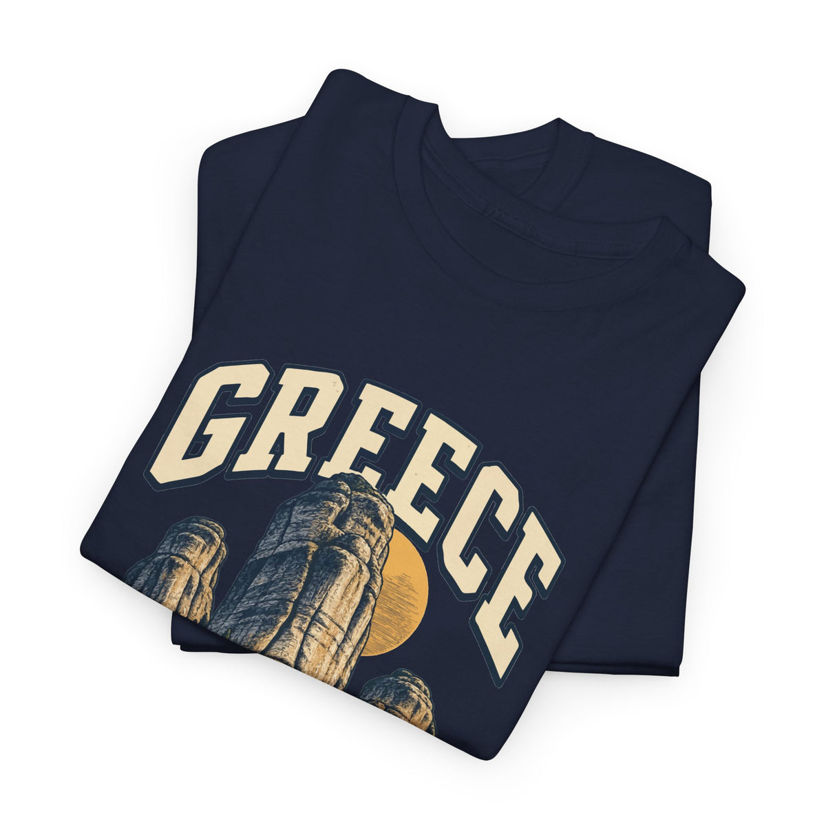 Folded Navy Greece Fresh Prints T-shirt showing cream country lettering and the upper part of its country illustration.