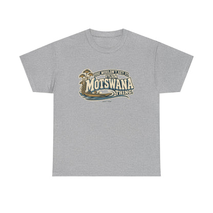 Front view of the Sport Grey Motswana Thing T-shirt with “You wouldn’t get it. It’s a Motswana thing.” ivory athletic lettering with blue shadows, an integrated mokoro canoe, papyrus reeds and water lines.