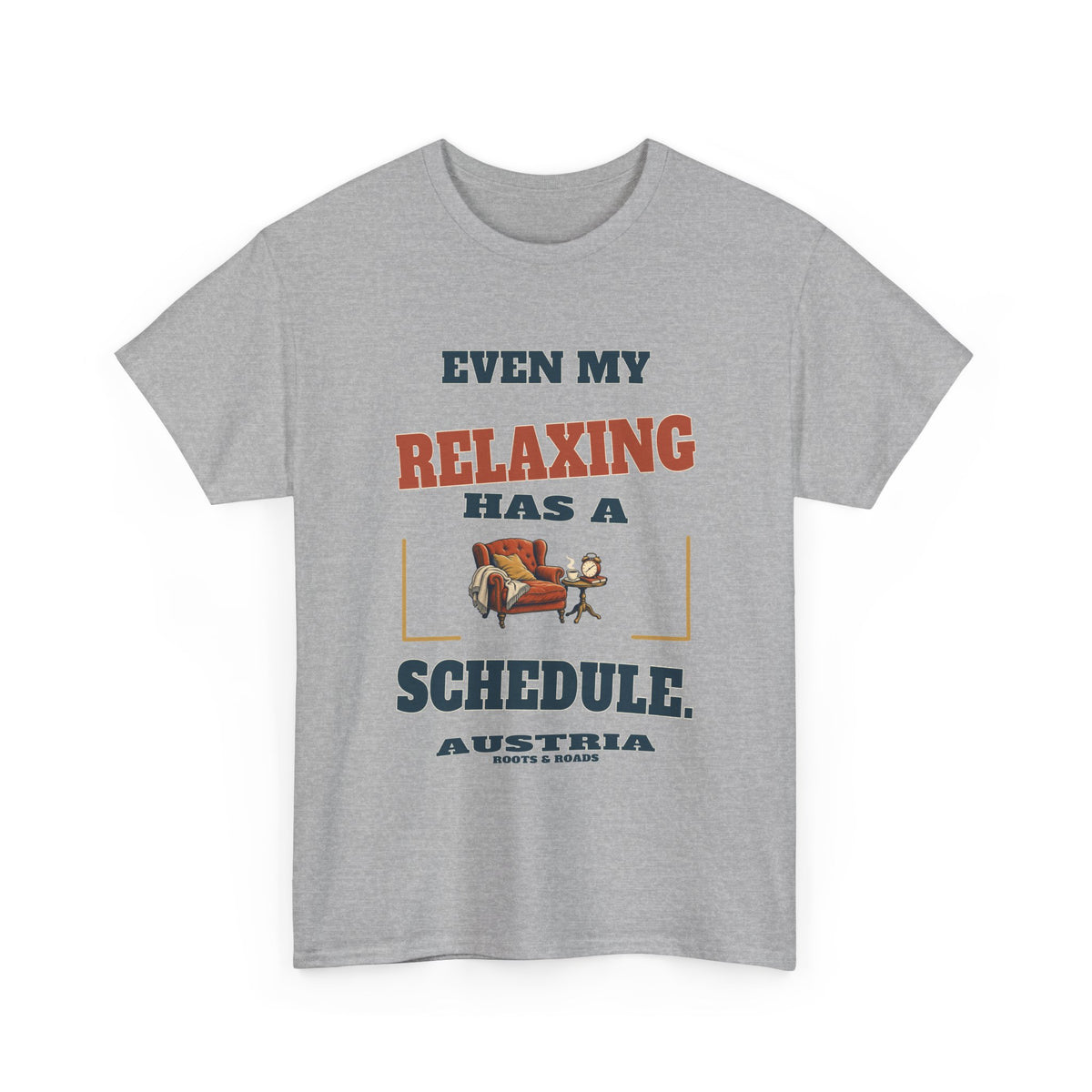 Austria Scheduled Relaxing T-Shirt in Sport Grey, with the full quote “Even my relaxing has a schedule.”, Austria label, and Roots & Roads signature on the front.