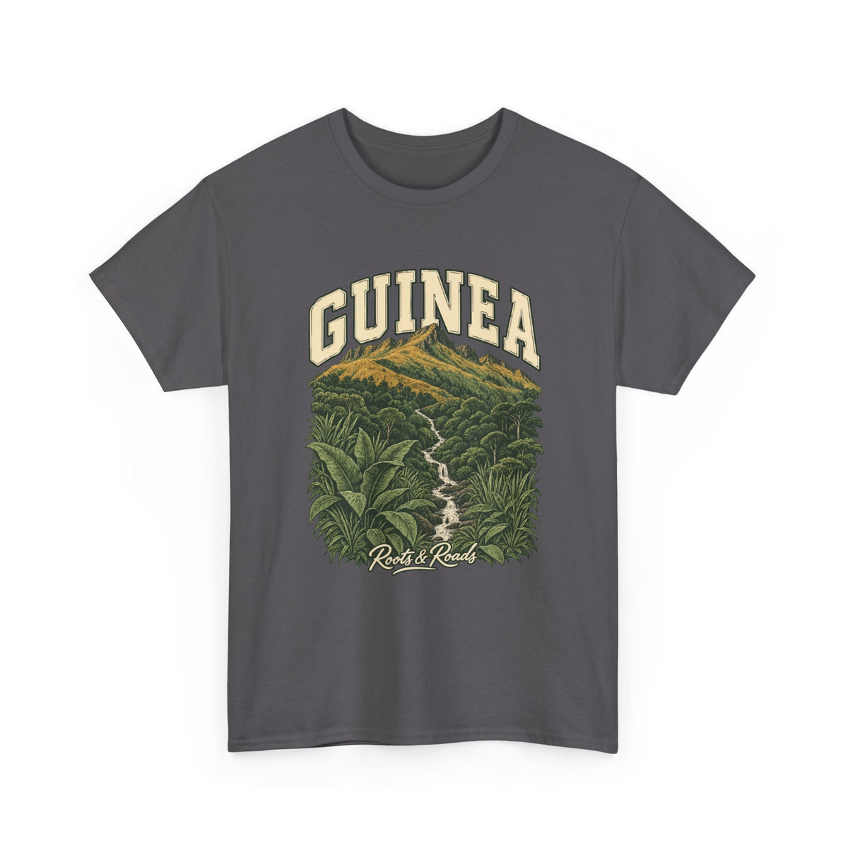 Front view of a Charcoal Gildan 5000 T-shirt with cream GUINEA lettering above mountain ridge, golden highland slopes, dense lower forest, narrow stream and broad leaves, finished with Roots & Roads script.