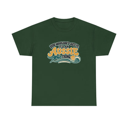 Front view of the Forest Green Aussie Thing T-shirt with “You wouldn’t get it. It’s an Aussie thing.” gold bubble lettering, cream contours, a kangaroo, curling wave and sunset.