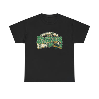 Front view of the Black Brazilian Thing T-shirt with “You wouldn’t get it. It’s a Brazilian thing.” green bubble lettering with ivory outlines, ochre shadows and an integrated toucan on a leafy branch.