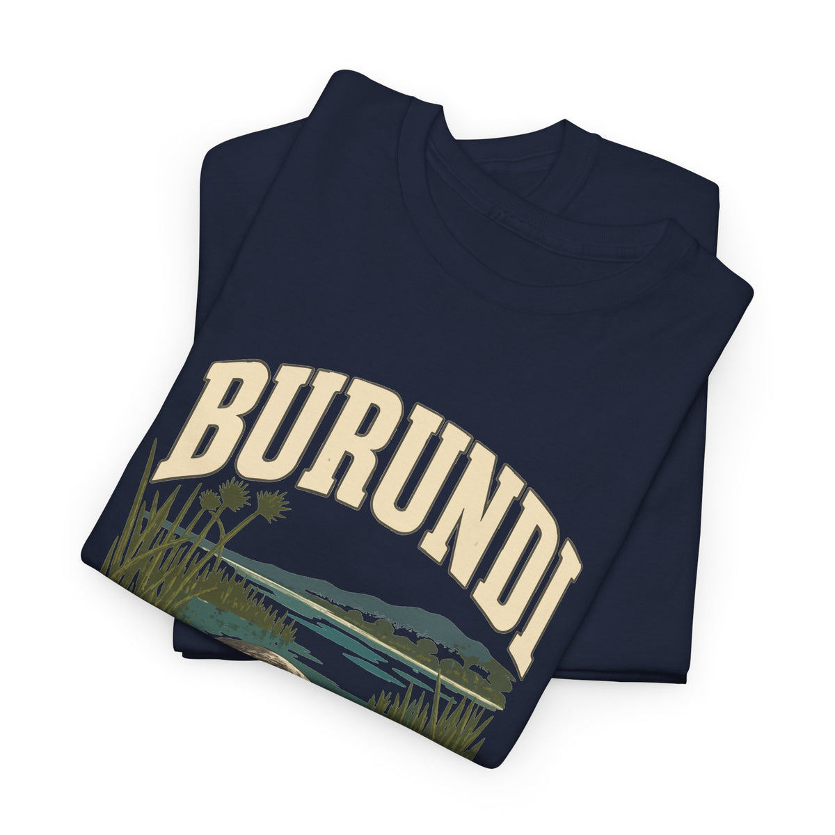 Folded Navy Burundi Fresh Prints T-shirt showing cream BURUNDI lettering, marsh plants and a distant shoreline.
