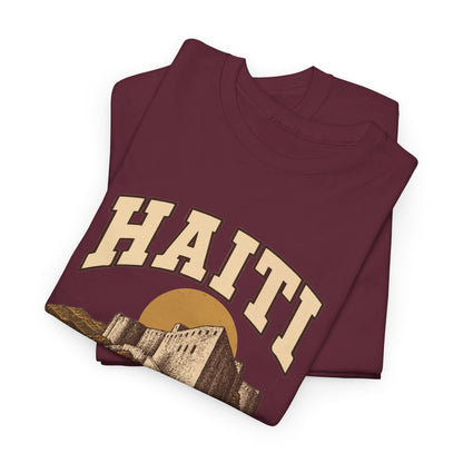 Folded Maroon Haiti Fresh Prints T-shirt showing cream country lettering and part of the illustration.
