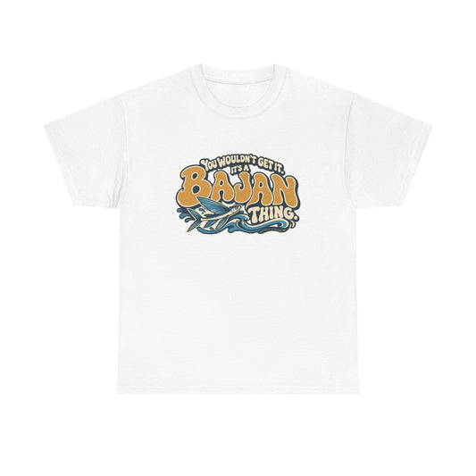 Front view of the White Bajan Thing T-shirt with “You wouldn’t get it. It’s a Bajan thing.” gold bubble lettering with ivory outlines, an integrated blue flying fish and curling waves.