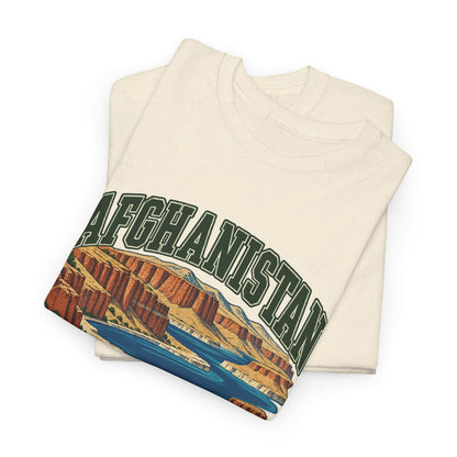 Folded Natural Afghanistan Fresh Prints T-shirt showing the green country lettering and blue-and-rust highland lake illustration.