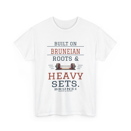 White Brunei gym T-shirt with “Built on Bruneian roots & heavy sets.”, loaded barbell, Brunei name and Roots & Roads signature on the front.