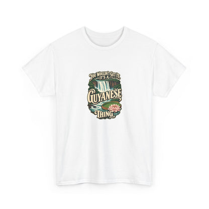 Guyana Guyanese Thing T-shirt in White, shaped front view; cream vintage sign-painted lettering with a waterfall and tropical water lily and the quote “You wouldn’t get it. It’s a Guyanese thing.”