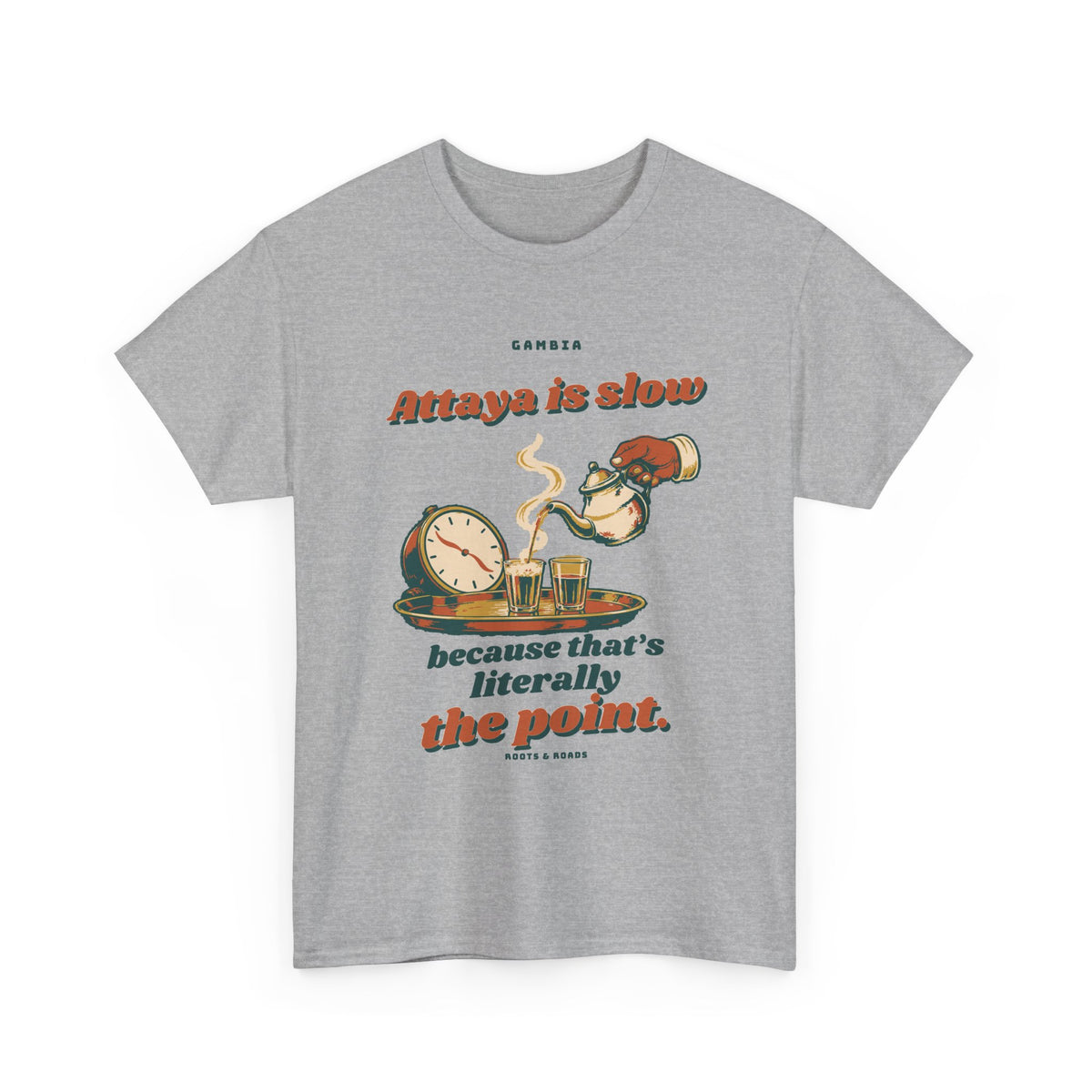 Gambia Attaya Takes Its Time T-Shirt in Sport Grey — expressive retro lettering with a teapot pouring into small glasses beside a relaxed clock on the front.