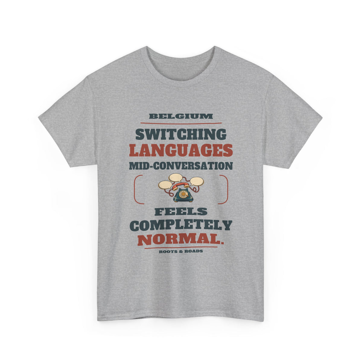 Belgium Switching Languages T-Shirt in Sport Grey — front print reads “Switching languages mid-conversation feels completely normal.” with Belgium and Roots & Roads signature.